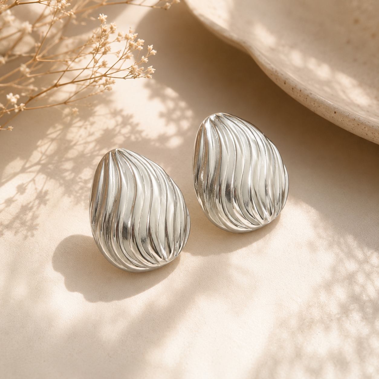 Silver Wave Statement Stud Earrings