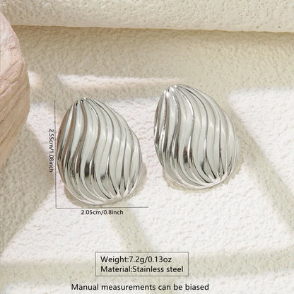 Silver Wave Statement Stud Earrings